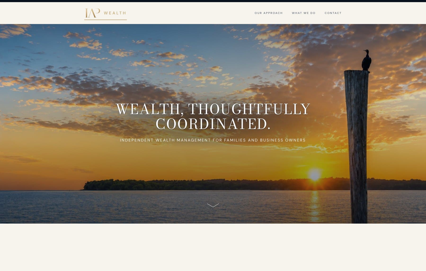 The IAP Wealth homepage: a gold monogram and the word WEALTH on a pale header, above a full-width photograph of a sunrise over open water with the headline 'Wealth, thoughtfully coordinated.'